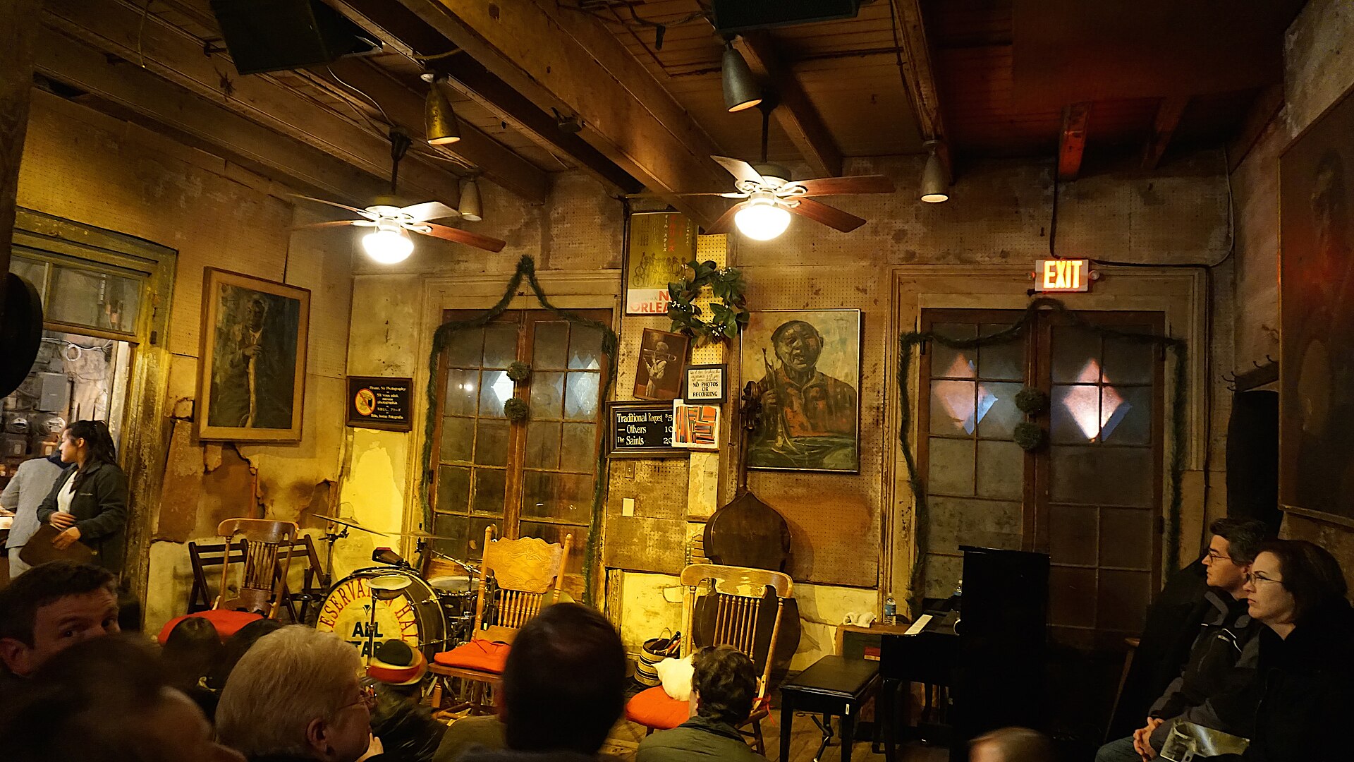 Instruments and benches inside the small performance room at Preservation Hall