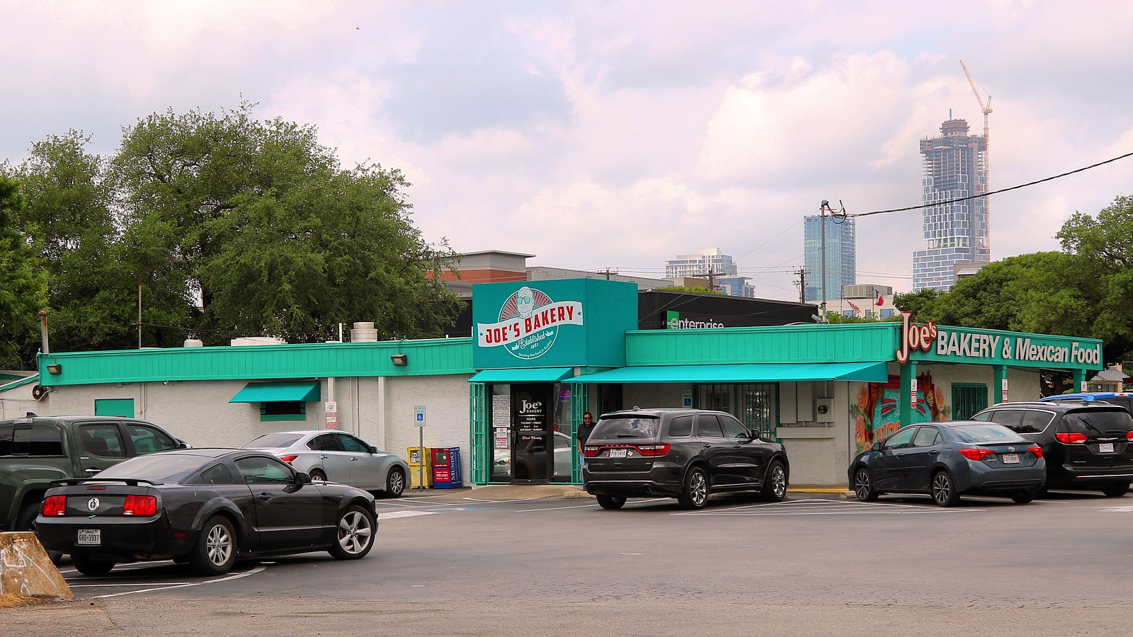 Joe's Bakery and Coffee Shop in East Austin with the downtown skyline behind it