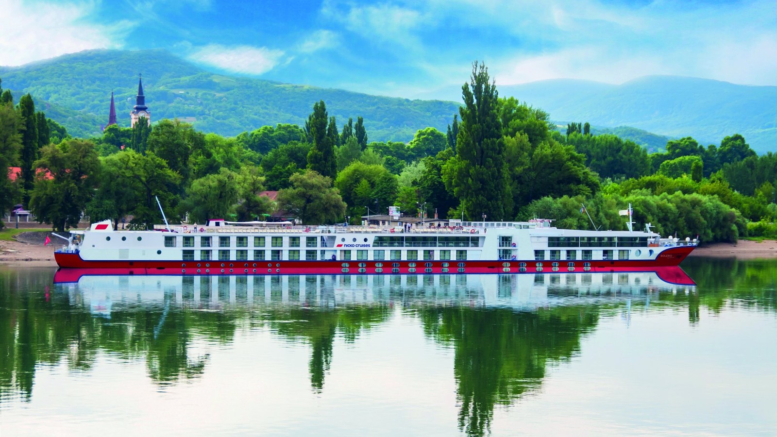 Daylight port-side view of MS Bolero on a river with a readable nicko cruises mark and Bolero bow name