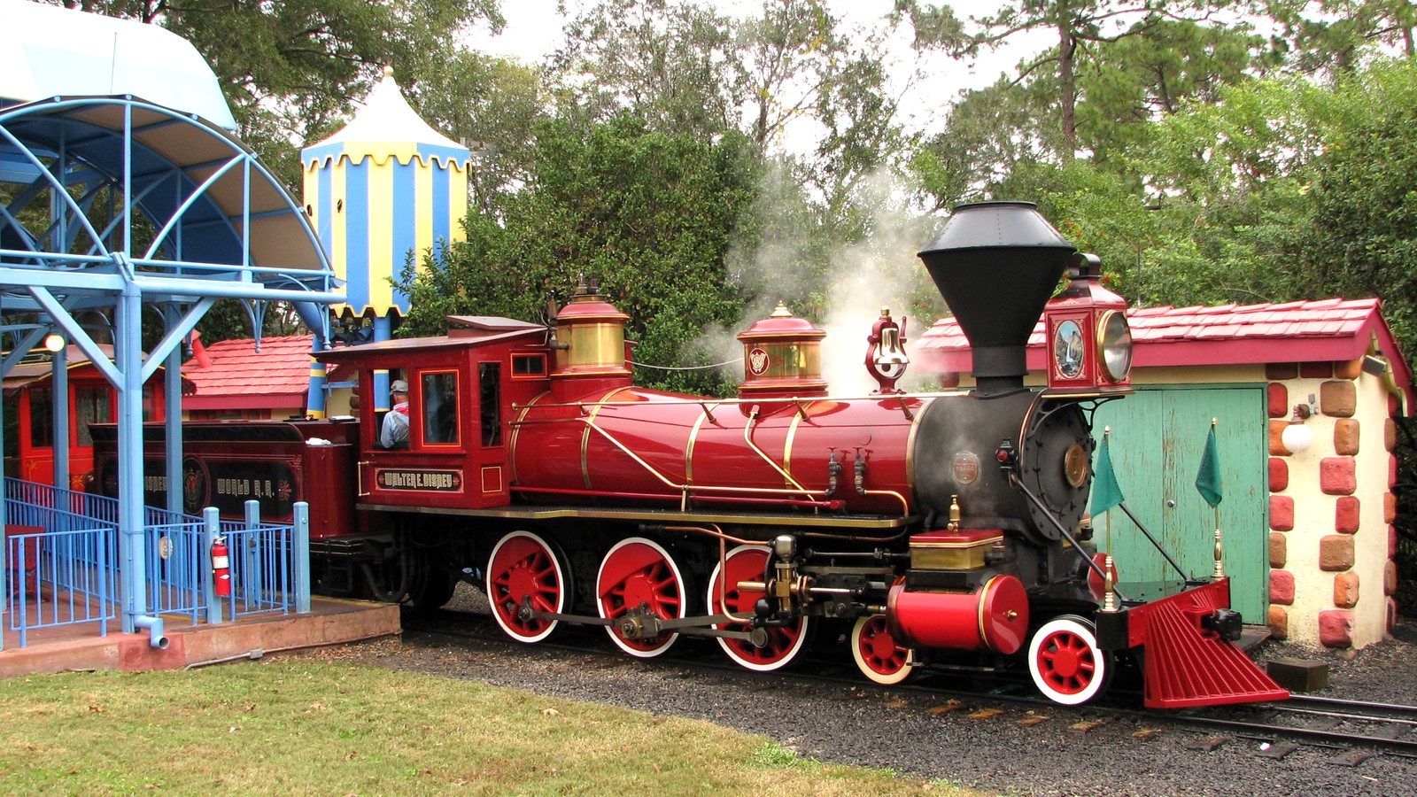 Walt Disney World Railroad steam locomotive and passenger cars at Magic Kingdom