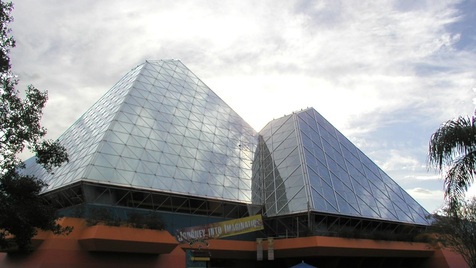 Journey into Imagination pavilion glass pyramids and entrance sign at EPCOT