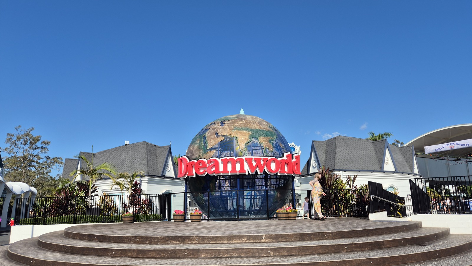 Dreamworld Gold Coast entrance globe with Dreamworld Flyer visible behind it