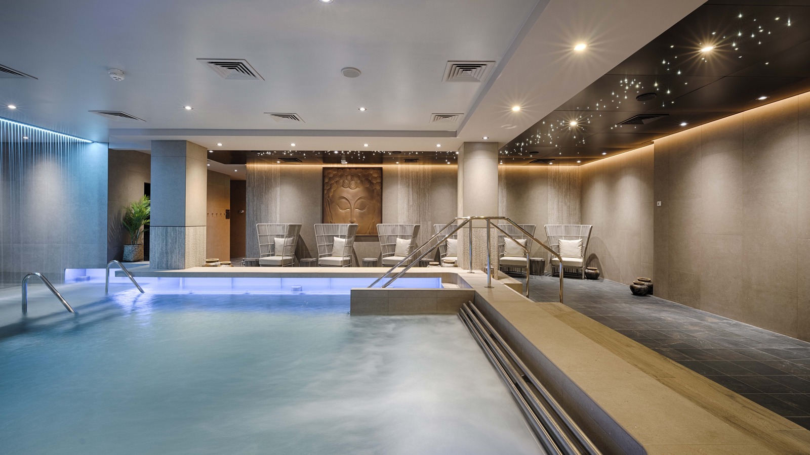 MSC Aurea Spa hydrotherapy pool and lounge with star ceiling lighting aboard MSC World Asia