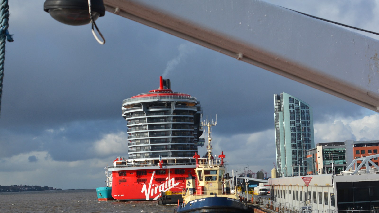 Stern view of Virgin Voyages Scarlet Lady cruise ship