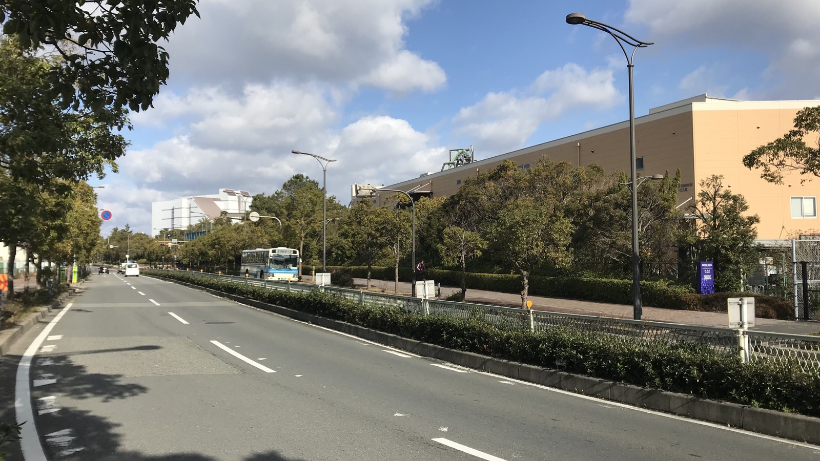 Southwest daytime view of Universal Studios Japan buildings and surrounding Osaka landscape