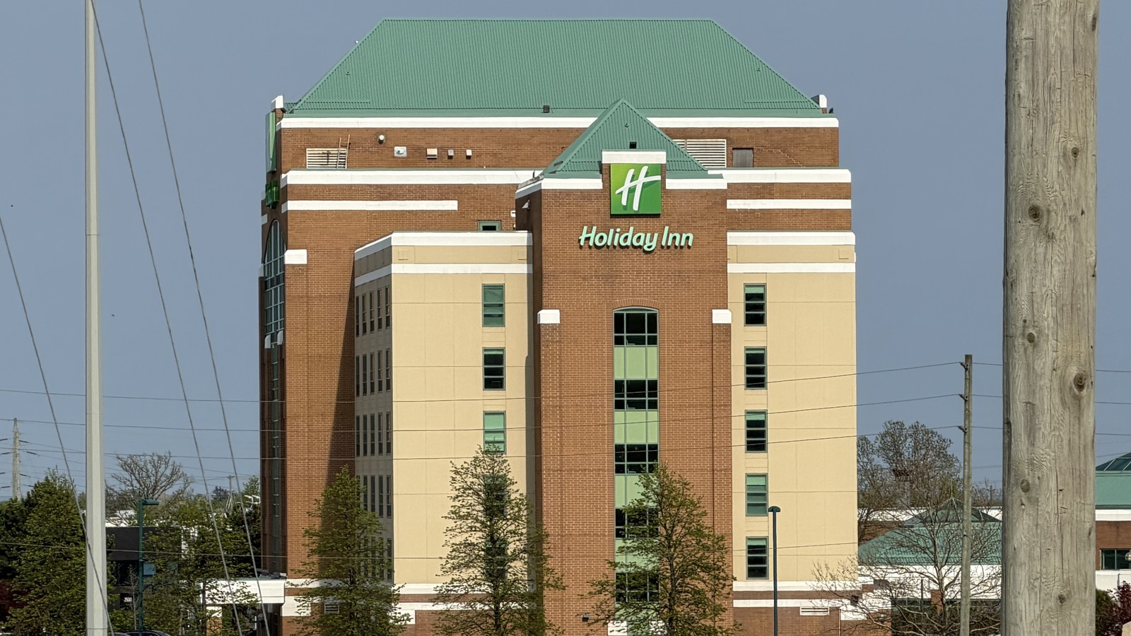 Holiday Inn Hotel and Suites exterior in Oakville with visible Holiday Inn branding