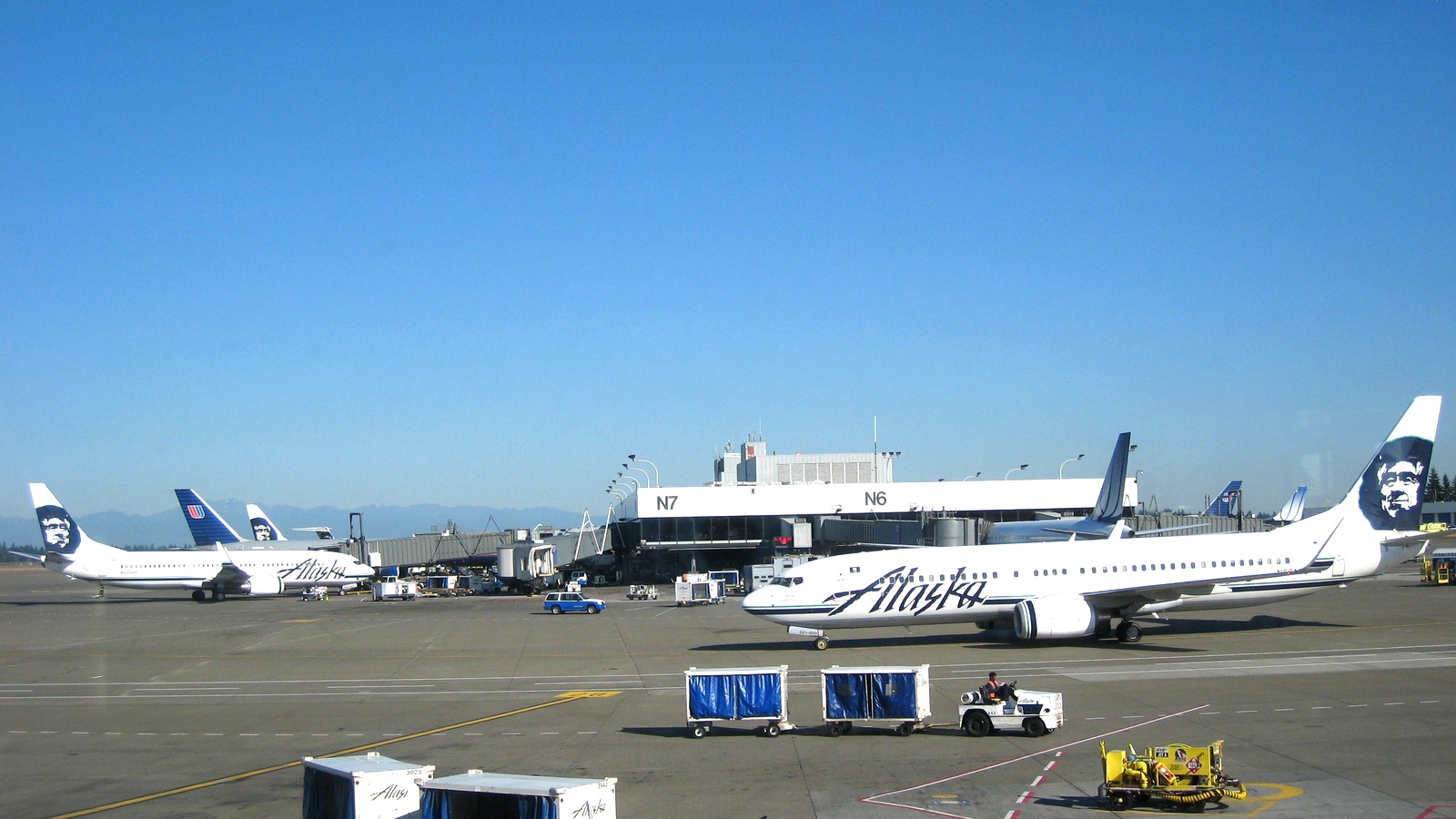 Seattle-Tacoma International Airport Terminal N exterior with Alaska Airlines jets at the gates