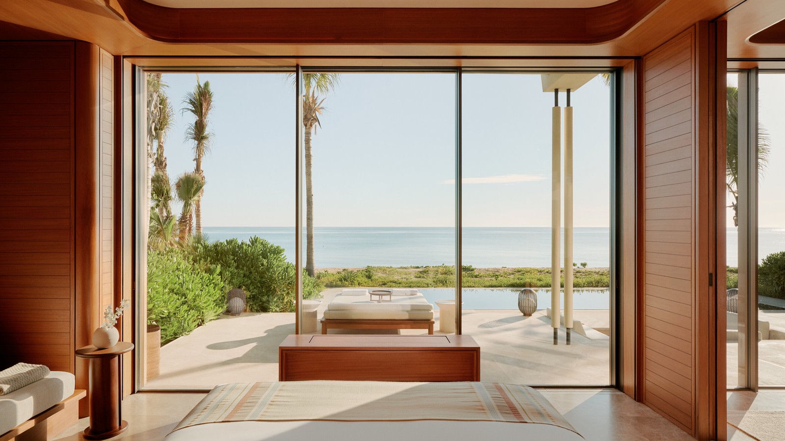 Beachfront casita bedroom at Amanvari overlooking a private pool and the East Cape ocean