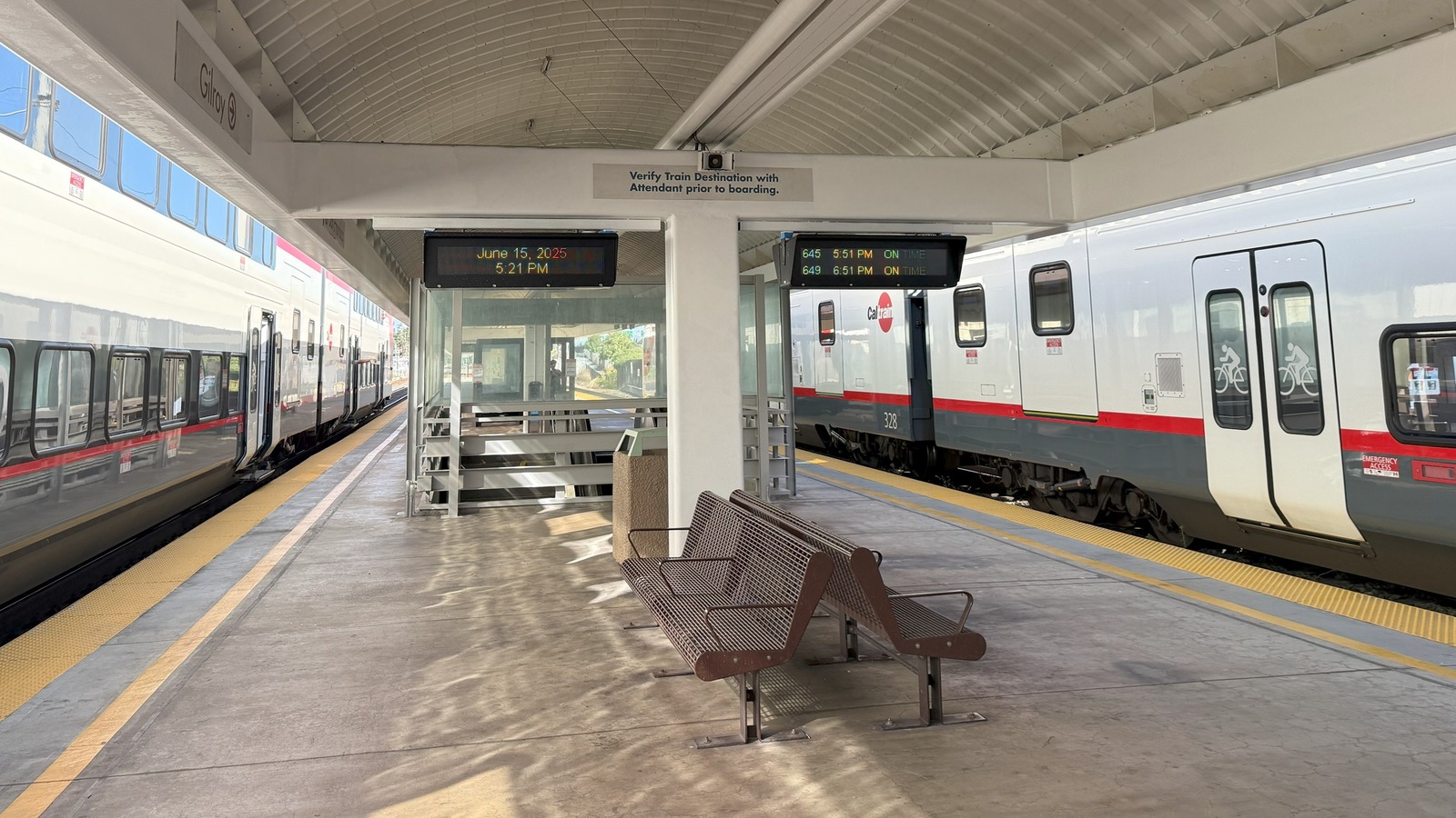 Daylight Tamien Caltrain station platform with a readable Caltrain mark on an electric train
