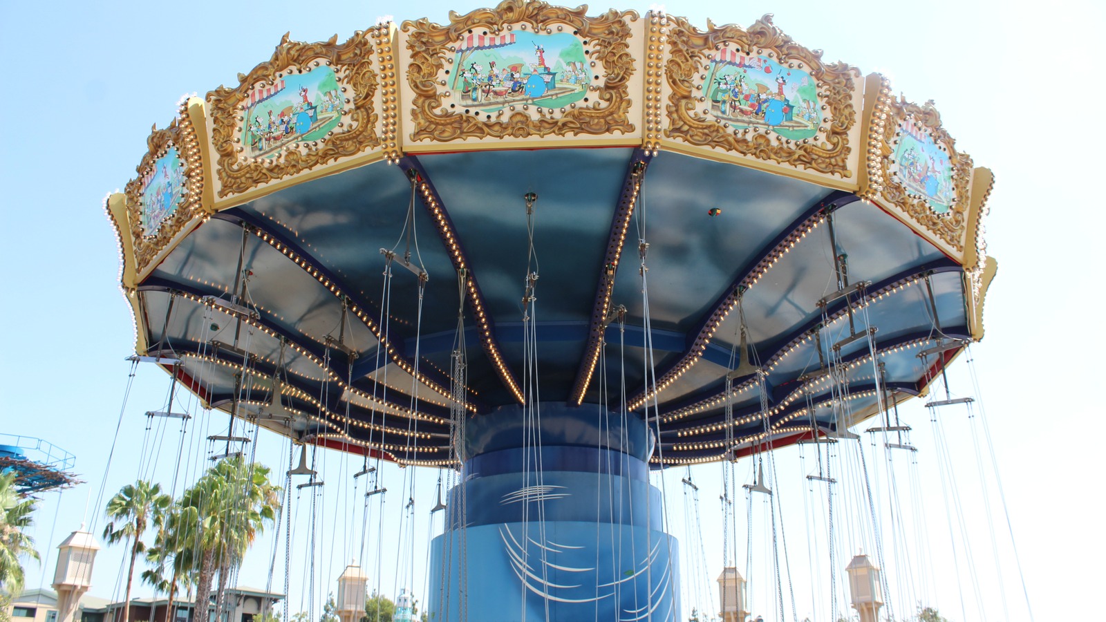 Silly Symphony Swings attraction at Disney California Adventure under a clear blue sky