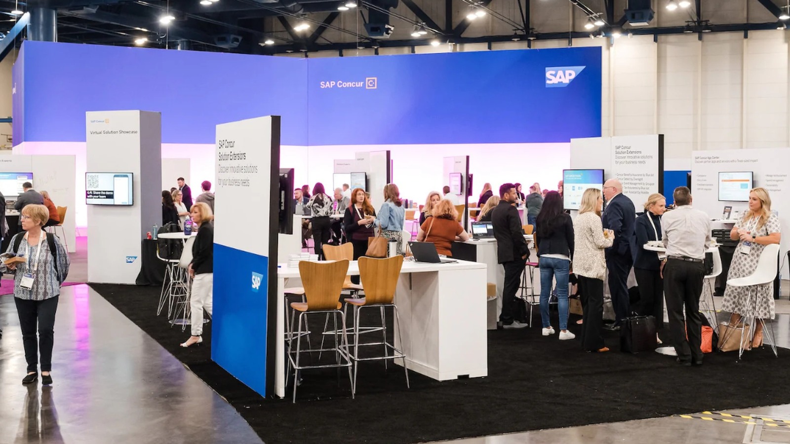 SAP Concur exhibition booth interior with product displays