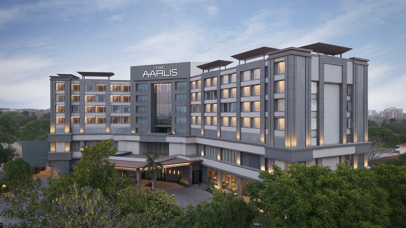 Exterior of The Aarlis Hotel Panchkula with illuminated rooftop signage