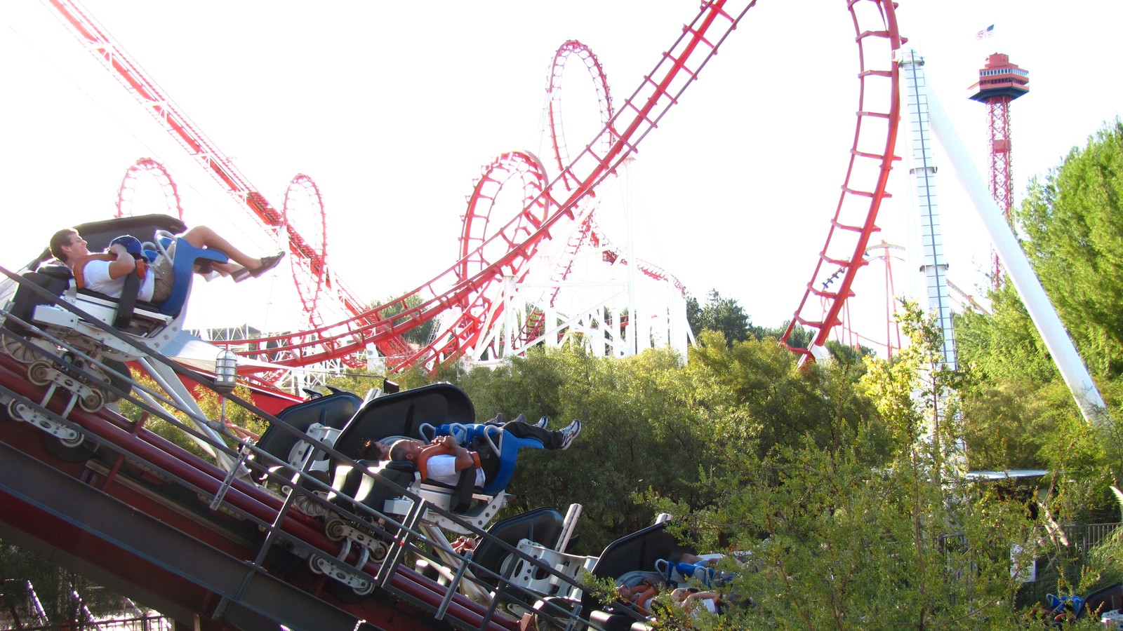 X2 fourth-dimension roller coaster red track and rotating seats at Six Flags Magic Mountain
