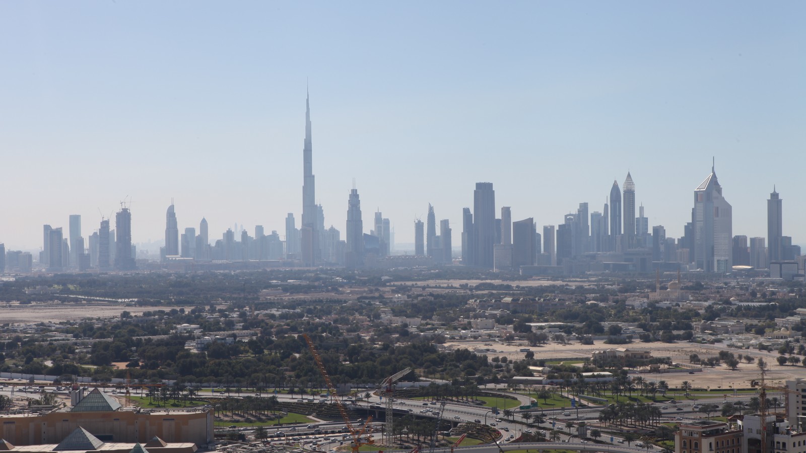Daytime Dubai skyline with high-rise hotels and towers