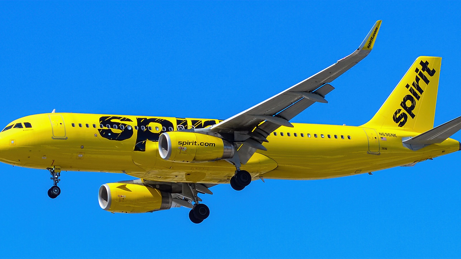 Spirit Airlines Airbus A320 N696NK airborne in yellow and blue livery