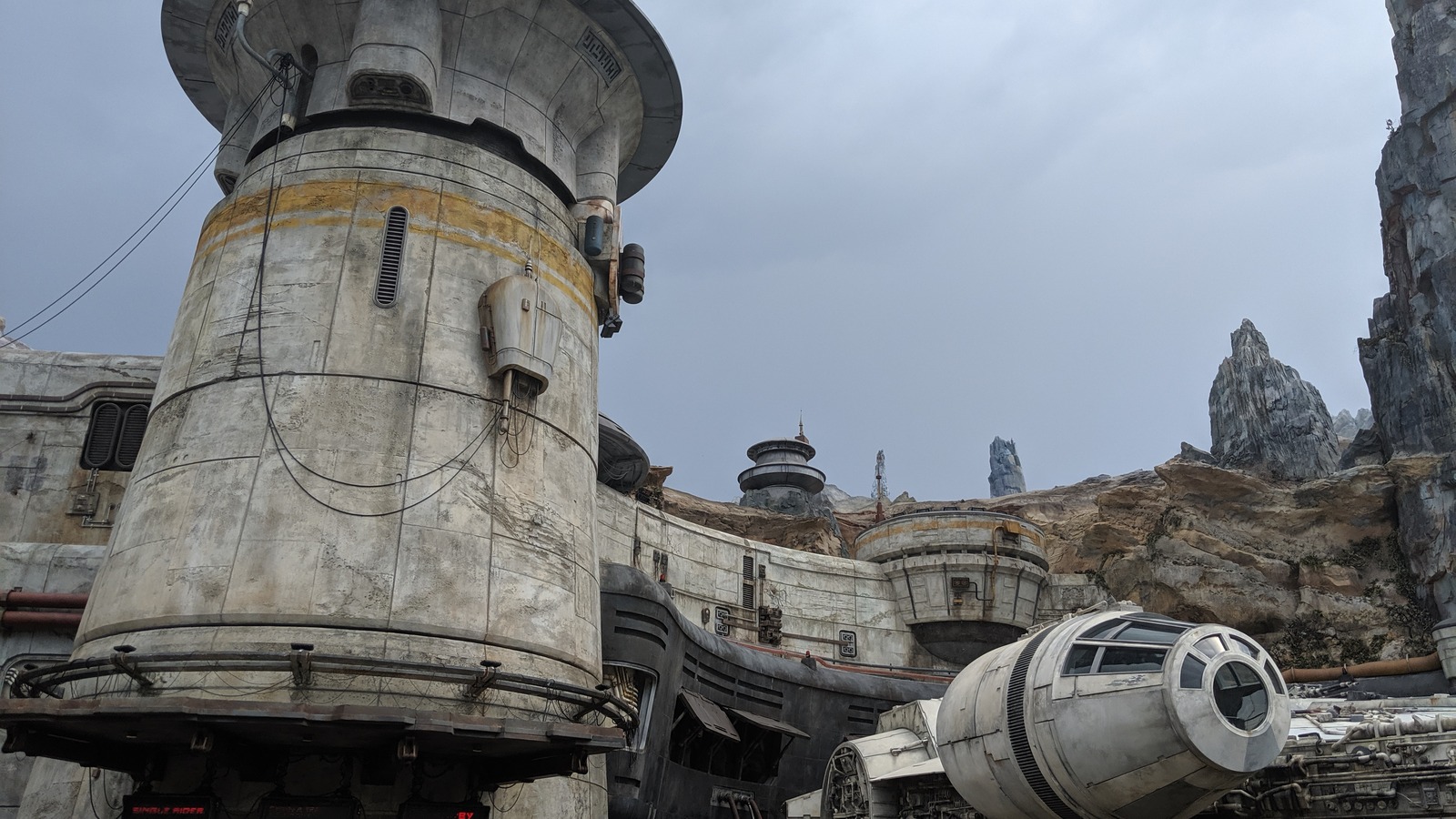 Millennium Falcon nose and Galaxy's Edge buildings at the Smugglers Run entrance