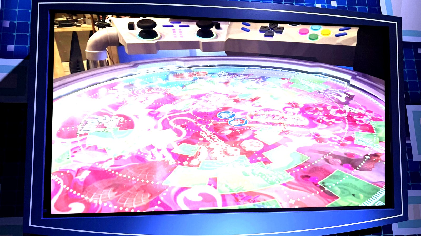 Sugar Rush Sweet Rescue candy world map display with game controller shown at D23 for Tokyo Disneyland