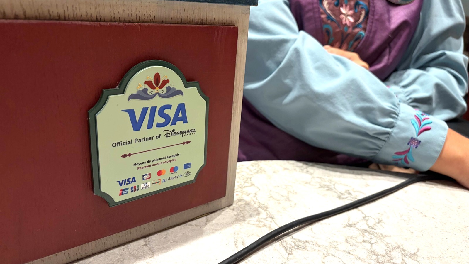 Themed Visa payment terminal at Disneyland Paris