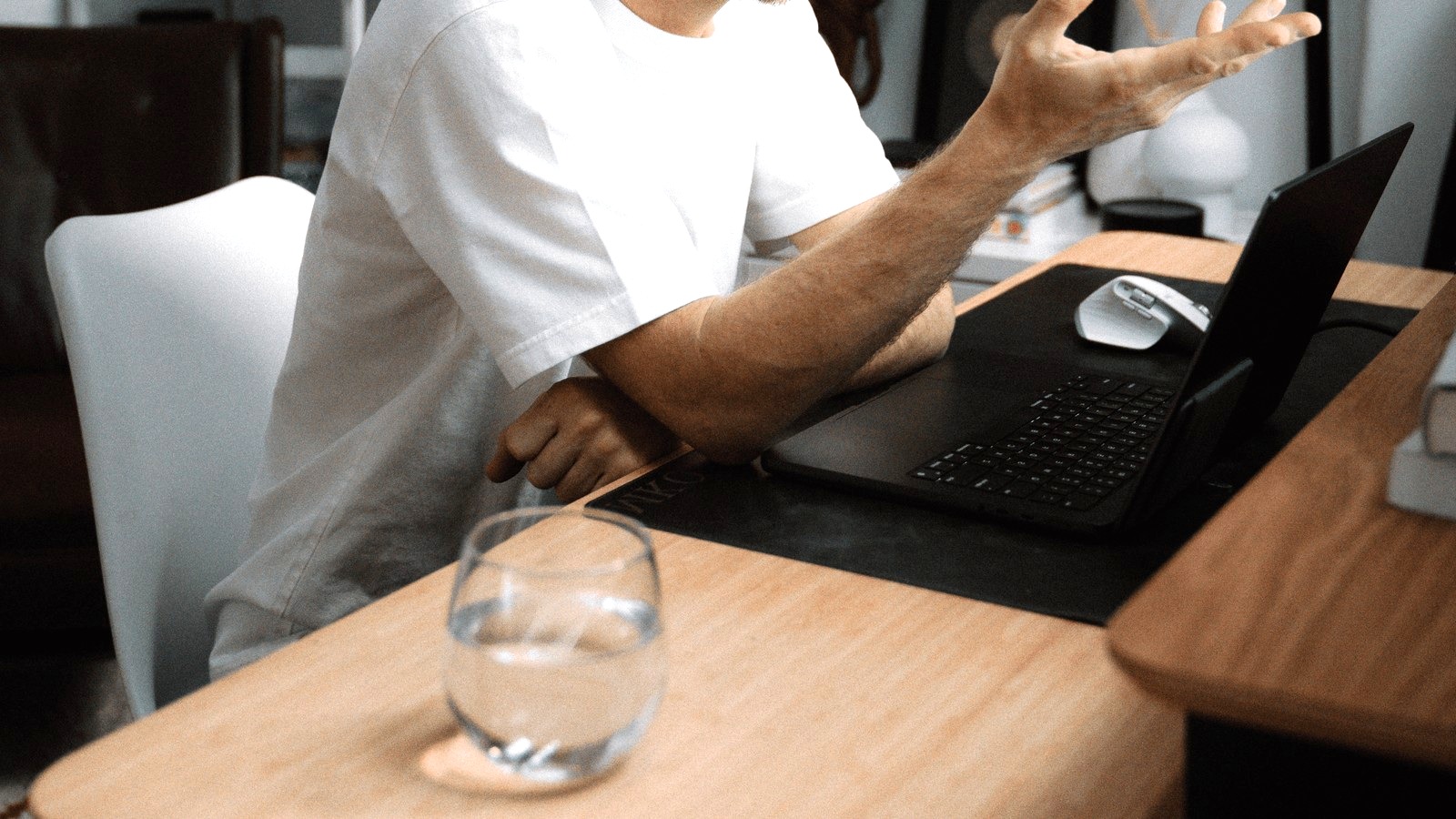 Travel advisor working on a laptop in an official Bilt OS for Hospitality image
