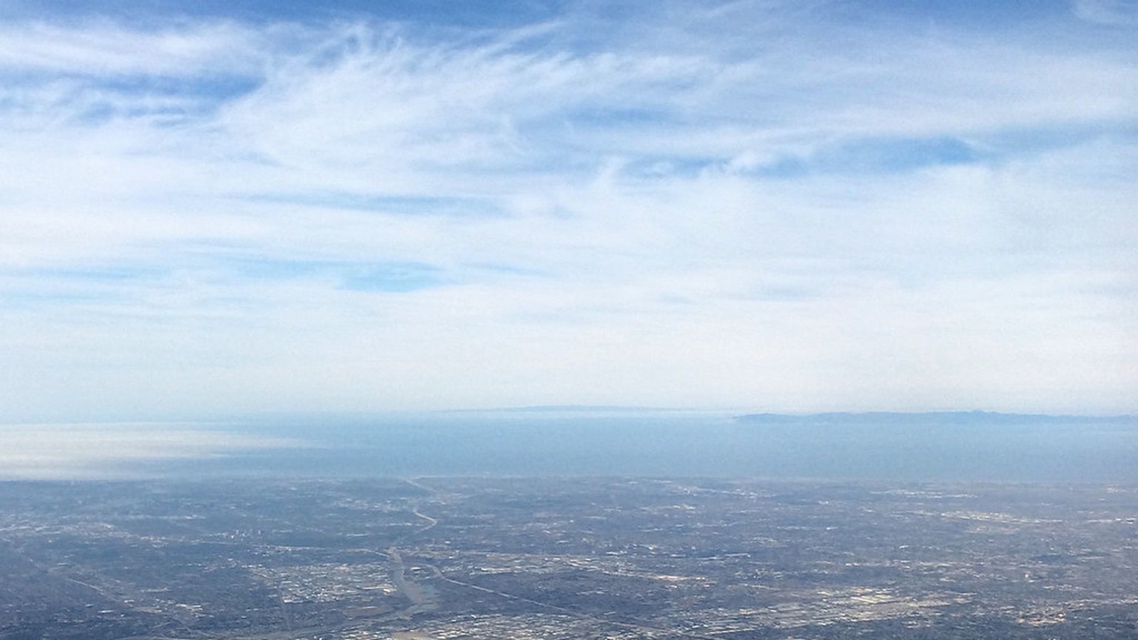Daytime view toward Los Angeles International Airport under blue sky
