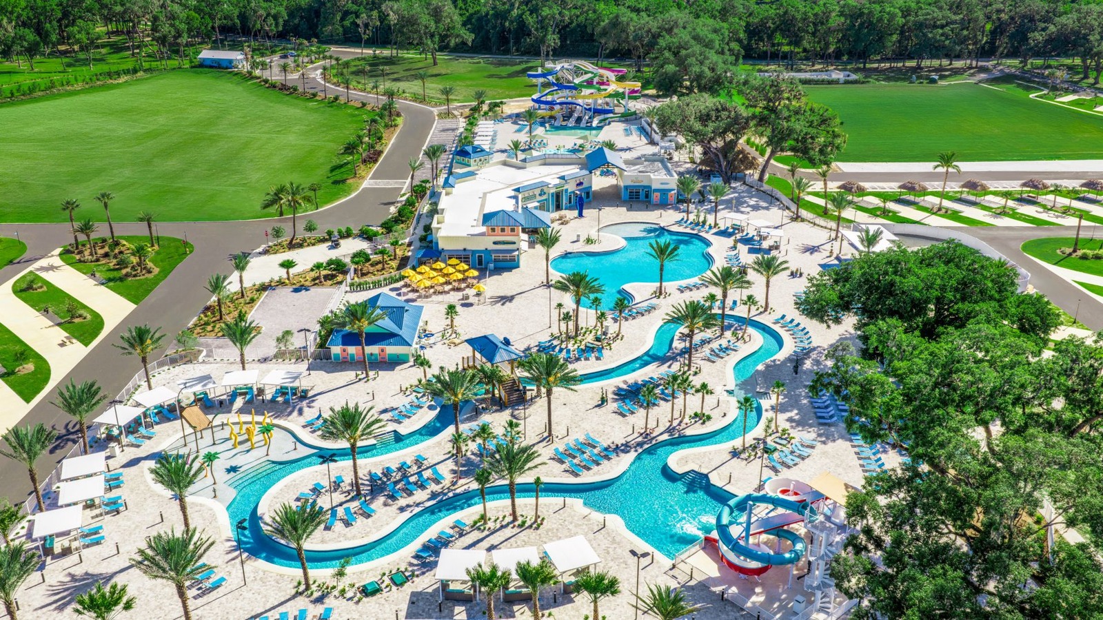 Pool and palm-lined grounds at Camp Margaritaville Resort Orange Lake in Citra Florida