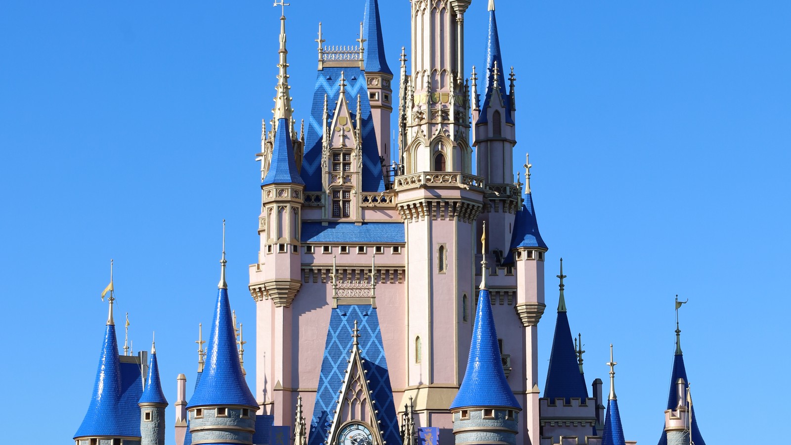 Cinderella Castle under a blue sky at Magic Kingdom in Walt Disney World