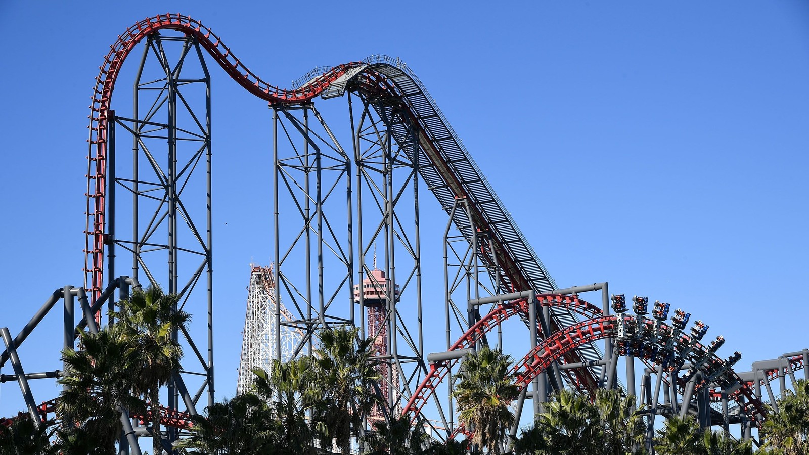 X2 4D wing coaster red track and rotating seats at Six Flags Magic Mountain on Baja Ridge