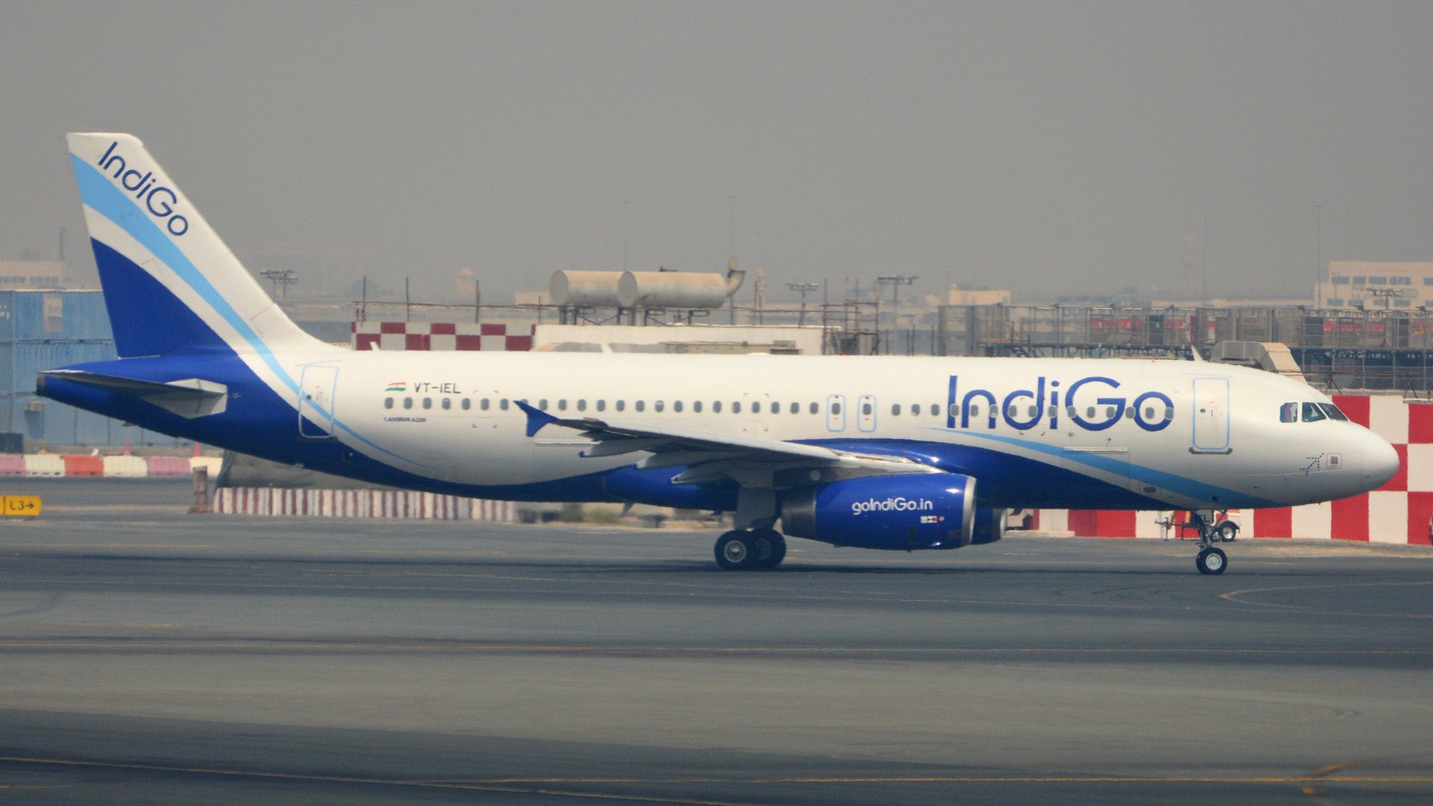 IndiGo Airbus A320 aircraft taxiing at an airport