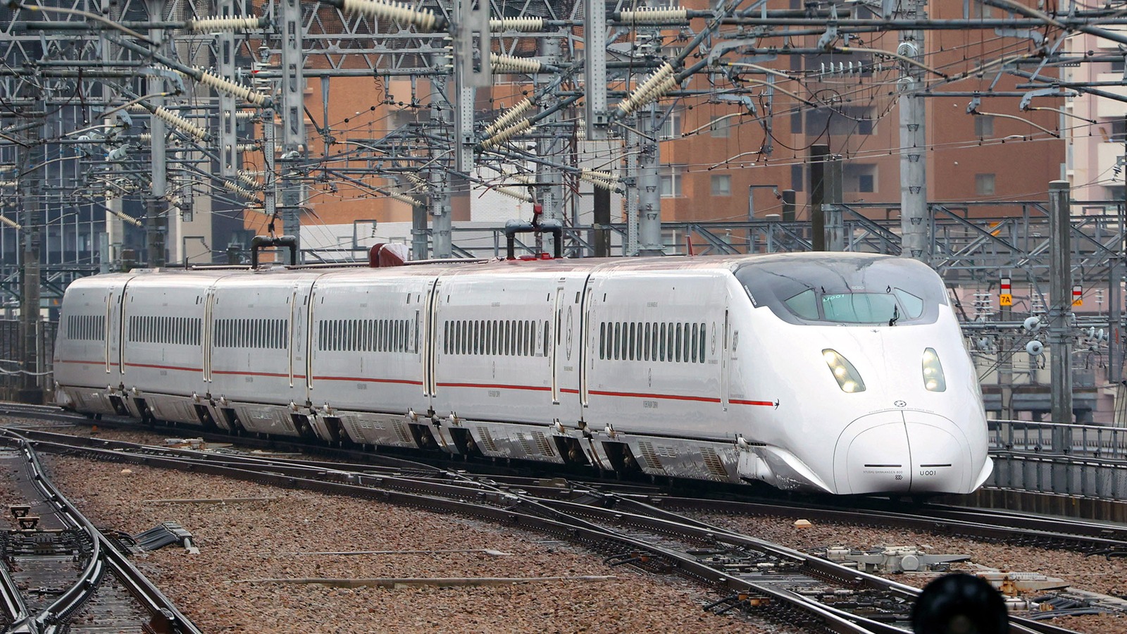 JR Kyushu 800-series Shinkansen train on railway tracks