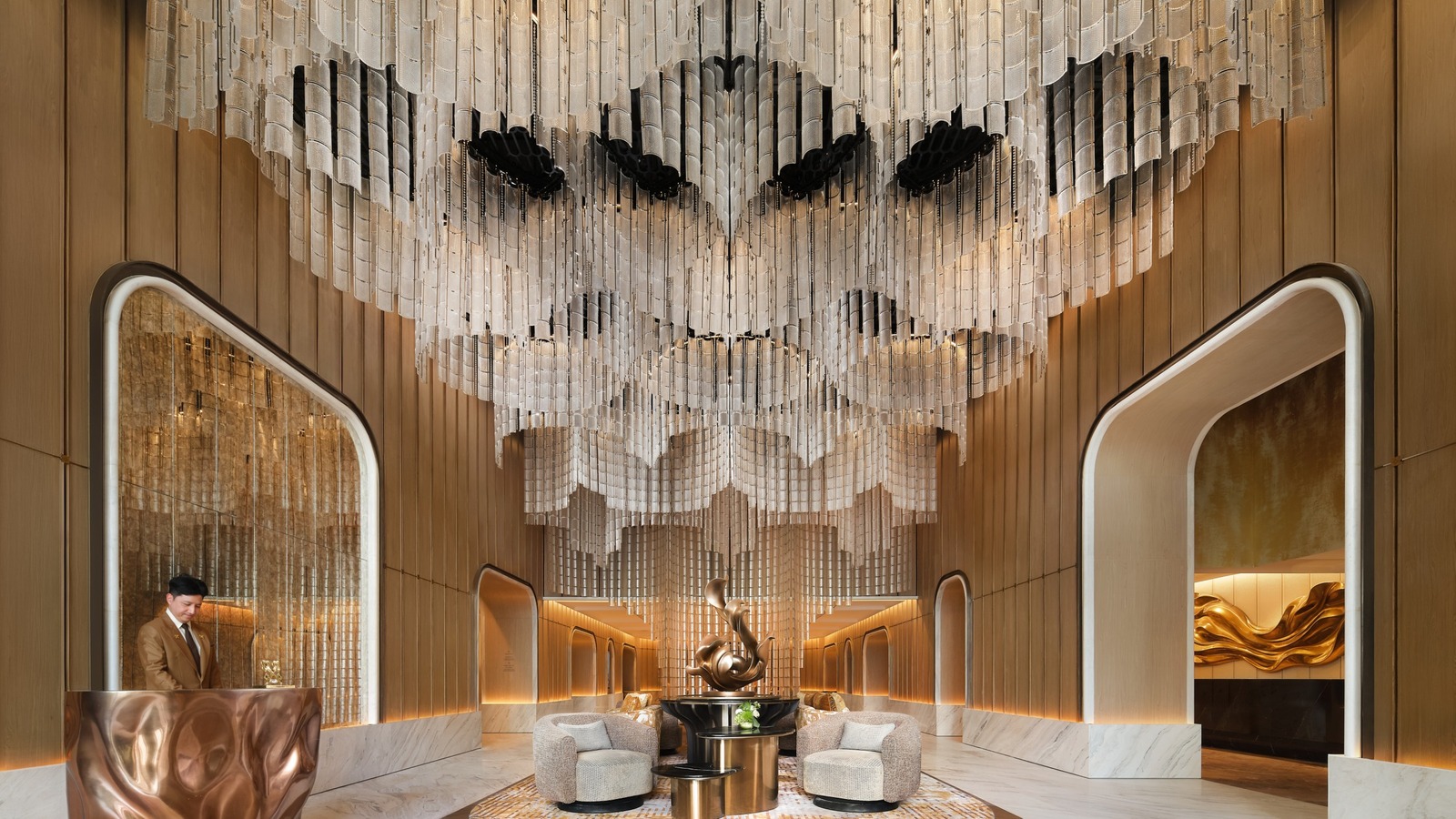 Fairmont Bangkok Sukhumvit lobby with signature ceiling installation and reception lounge