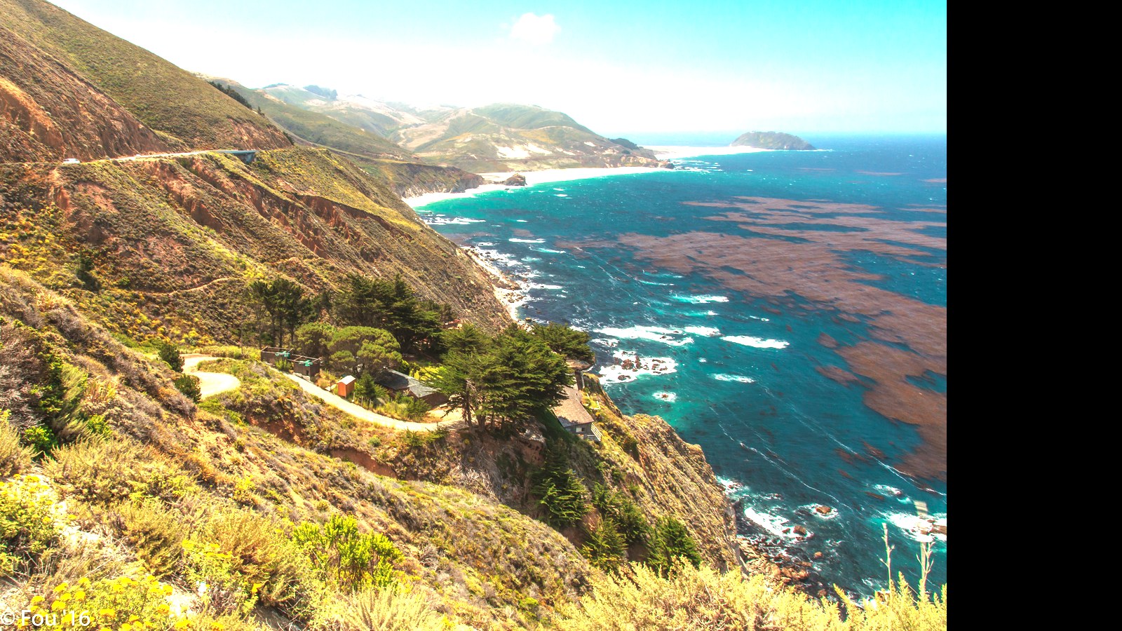 Vehicles traveling a coastal stretch of Highway 101 in California