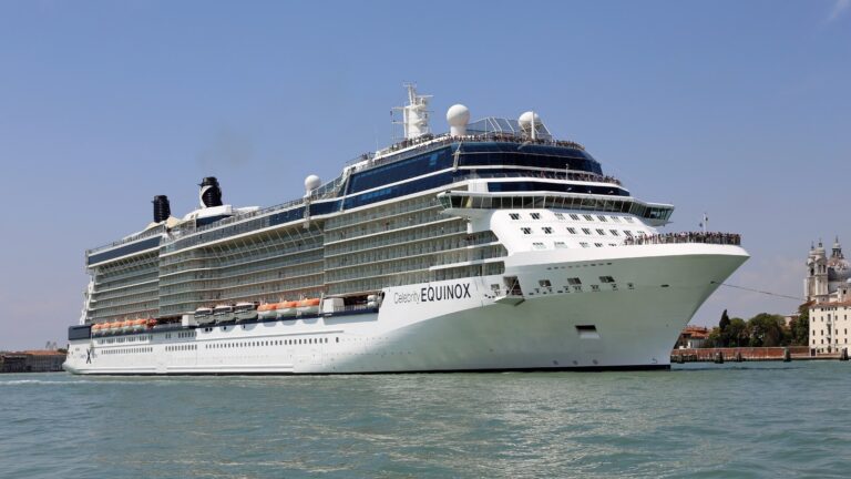 Celebrity Equinox cruise ship exterior with blue X funnel marking