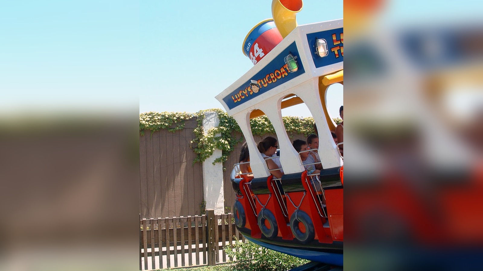 Lucy's Tugboat, later renamed Rapid River Run, rocking on its track in Camp Snoopy at Knotts Berry Farm