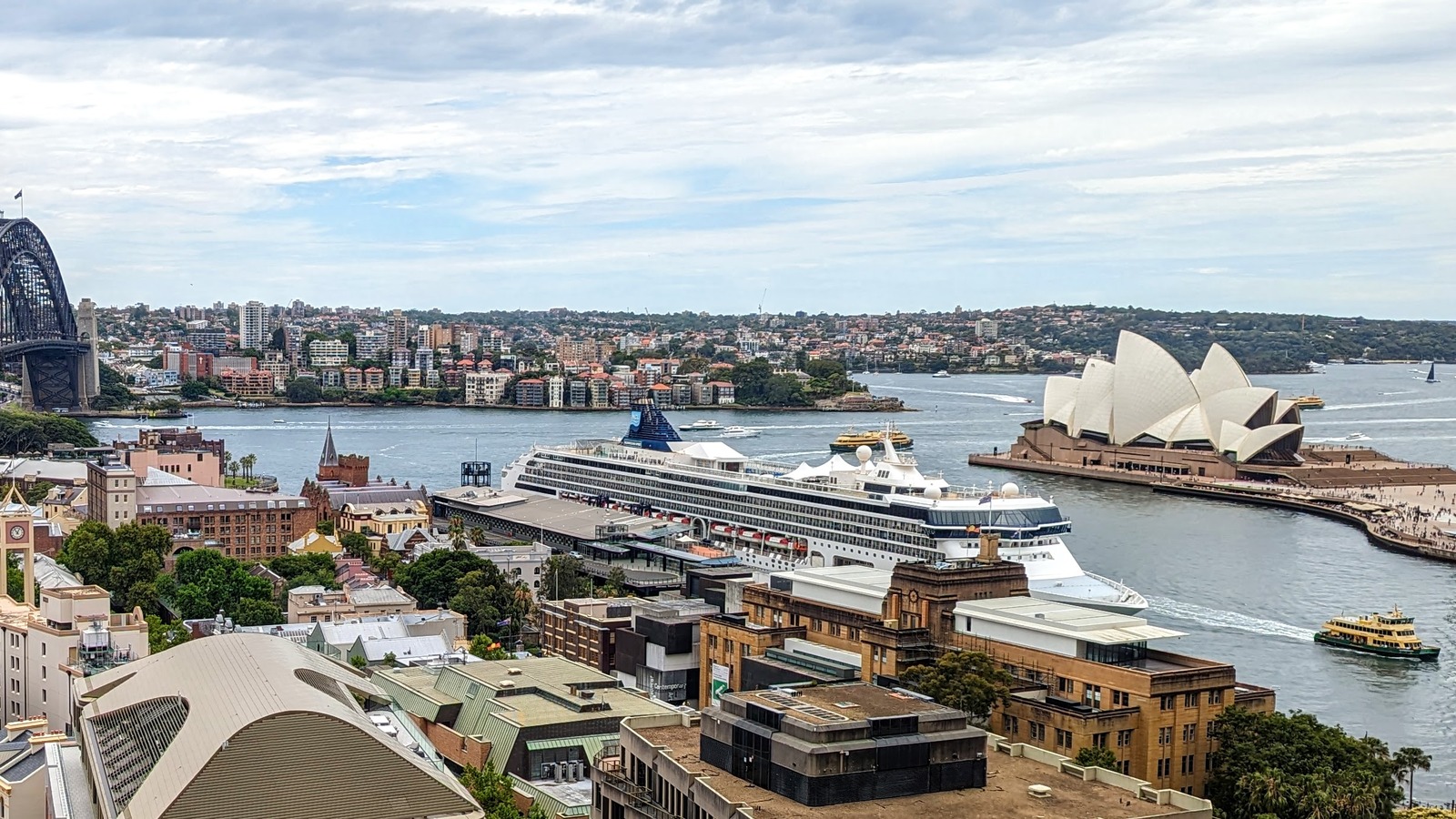 Norwegian Spirit docked at Sydney Overseas Passenger Terminal, Circular Quay, showing the NCL hull used for 2028 Hawaii and South Pacific homeporting.
