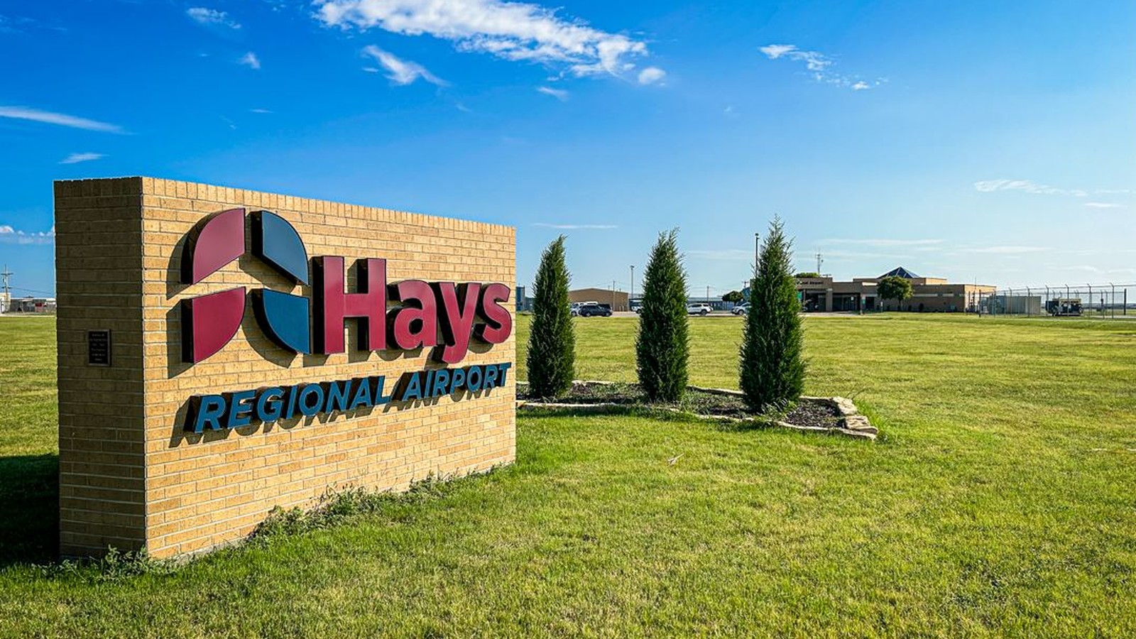 Hays Regional Airport entrance monument sign and terminal buildings at HYS Kansas