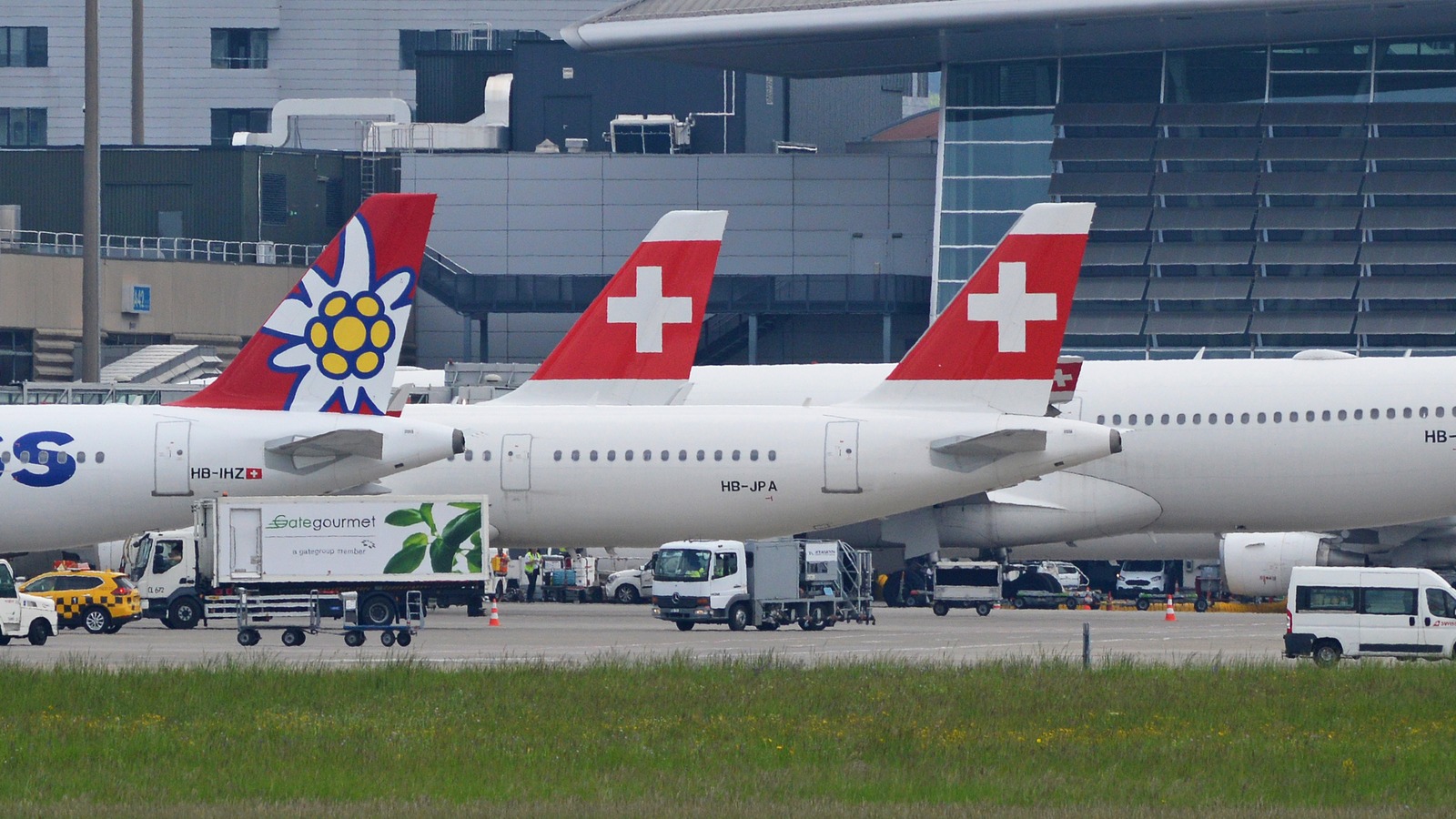 SWISS aircraft and ground crews at Zurich Airport Terminal A
