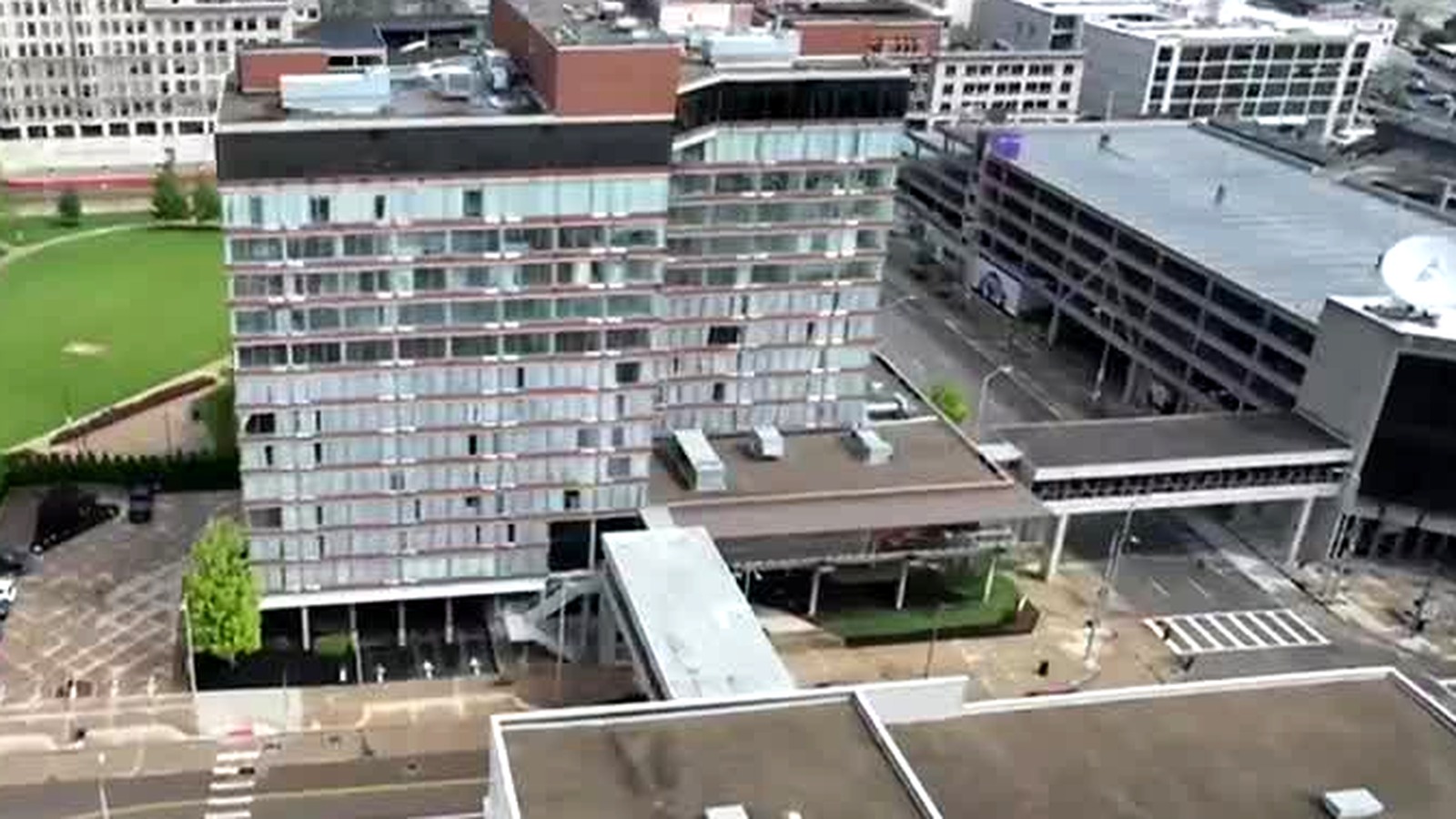 Aerial view of the Dayton Vitality Hotel tower and skywalk connection in downtown Dayton