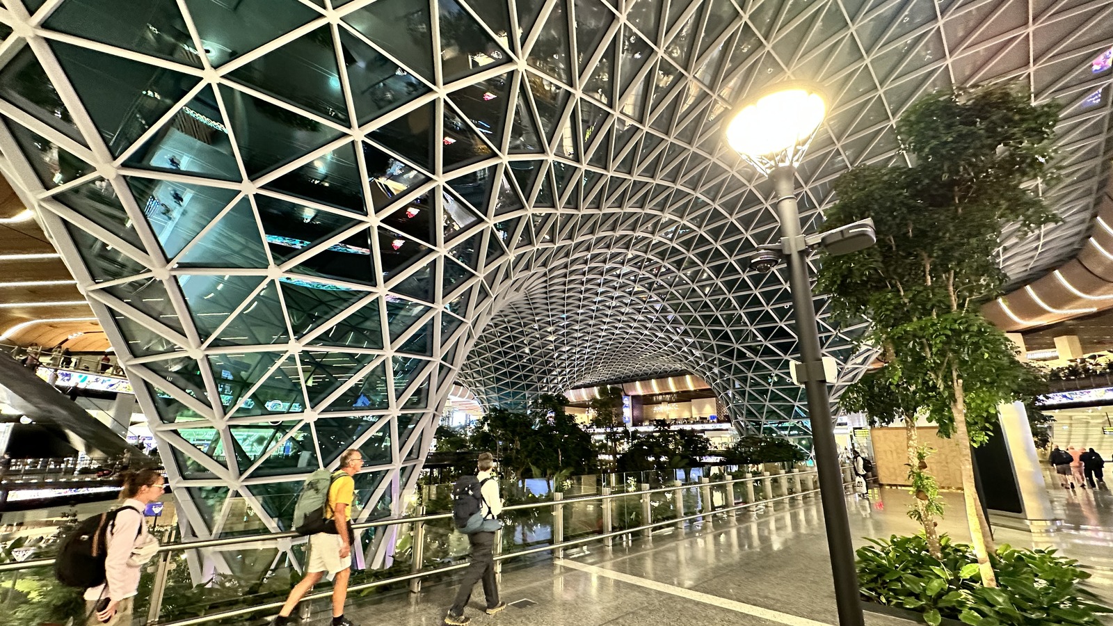 Indoor tropical garden and walkways inside Hamad International Airport in Doha