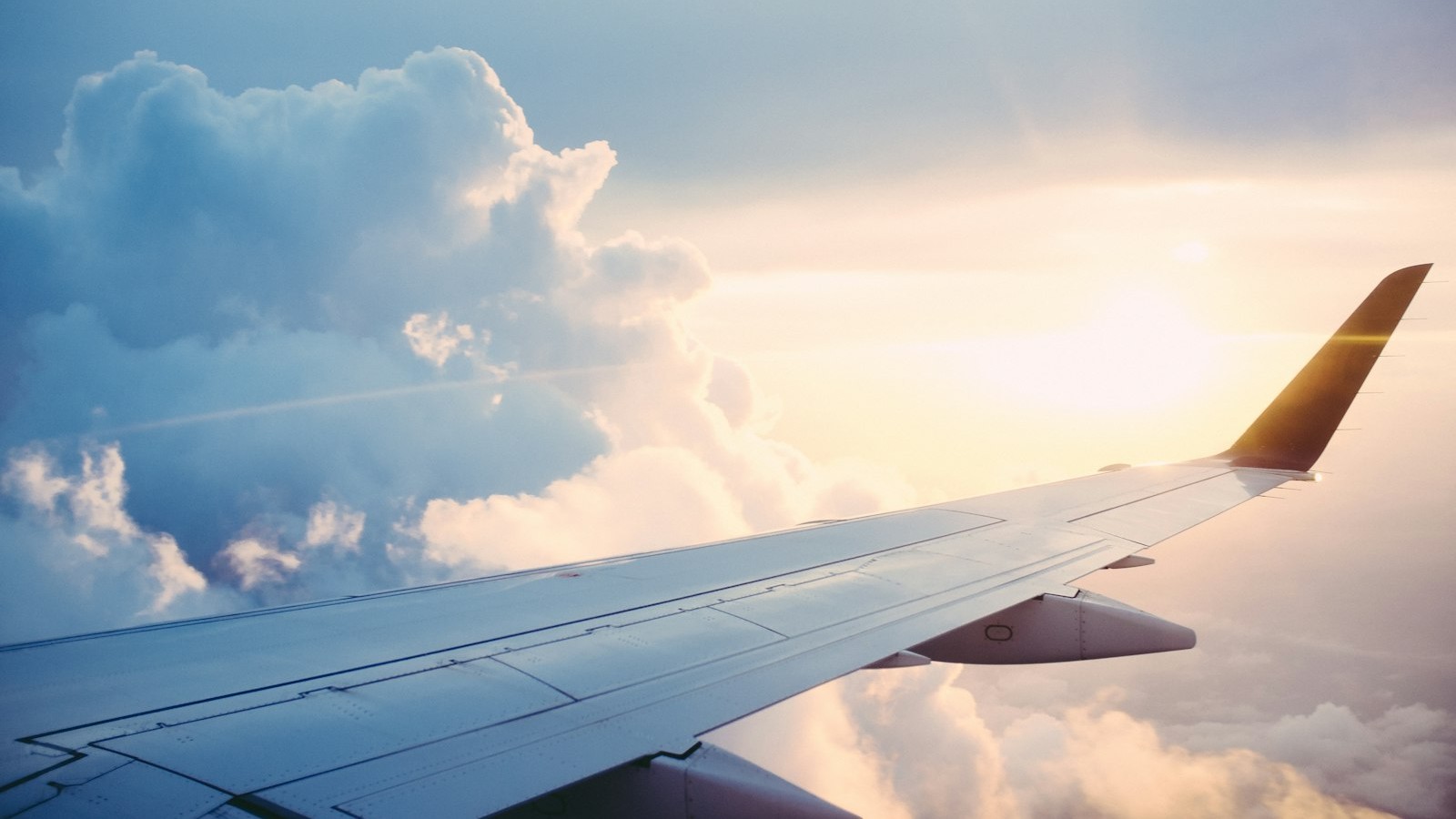 Commercial passenger jet climbing after takeoff under clear sky