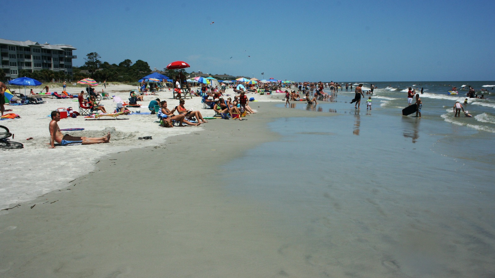 Hilton Head Island beach shoreline with sand and ocean under clear sky