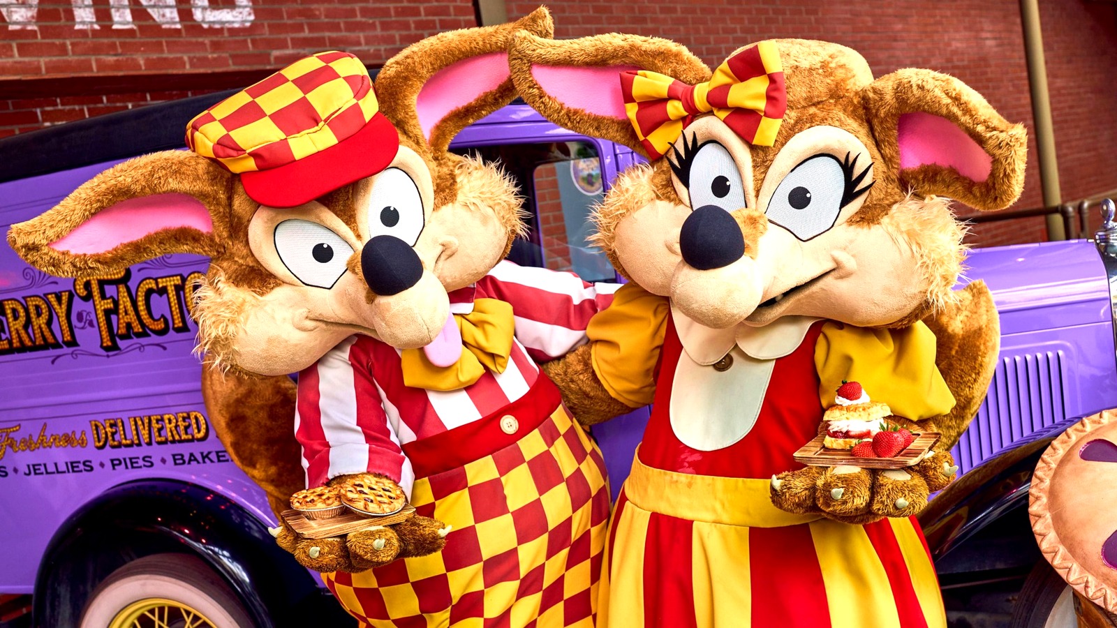 Crafty Coyote characters hold boysenberry pies and strawberry shortcake outside Craftys Kitchen theming at Knotts Berry Farm