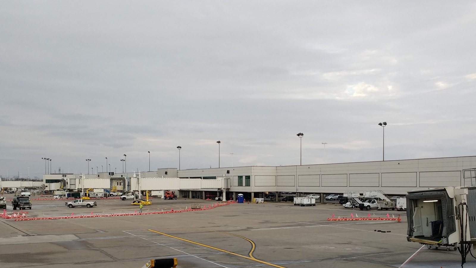 Exterior of Nashville International Airport Concourse A in daylight, Tennessee airport identity for the license-scanner advisory.