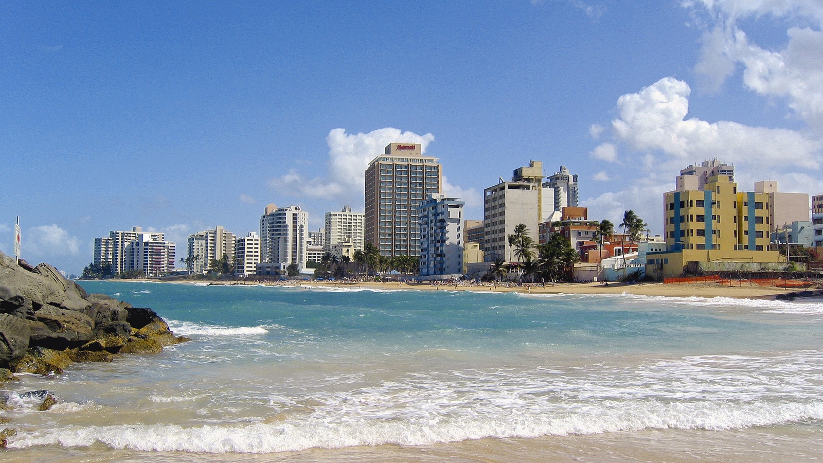 Condado beach shoreline and hotel district in San Juan Puerto Rico under clear daytime sky