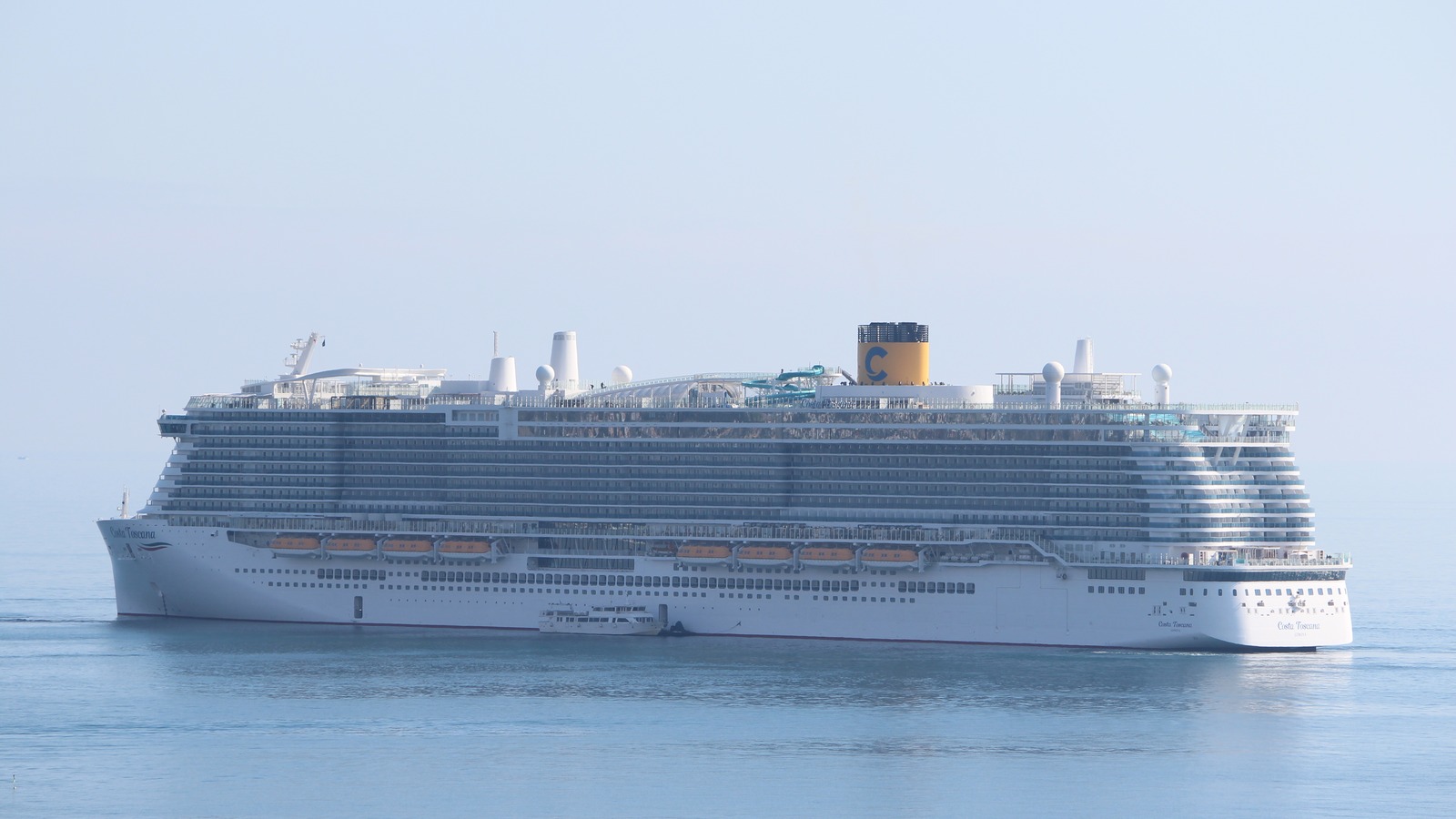 Costa Toscana cruise ship at sea with yellow funnel and C logo