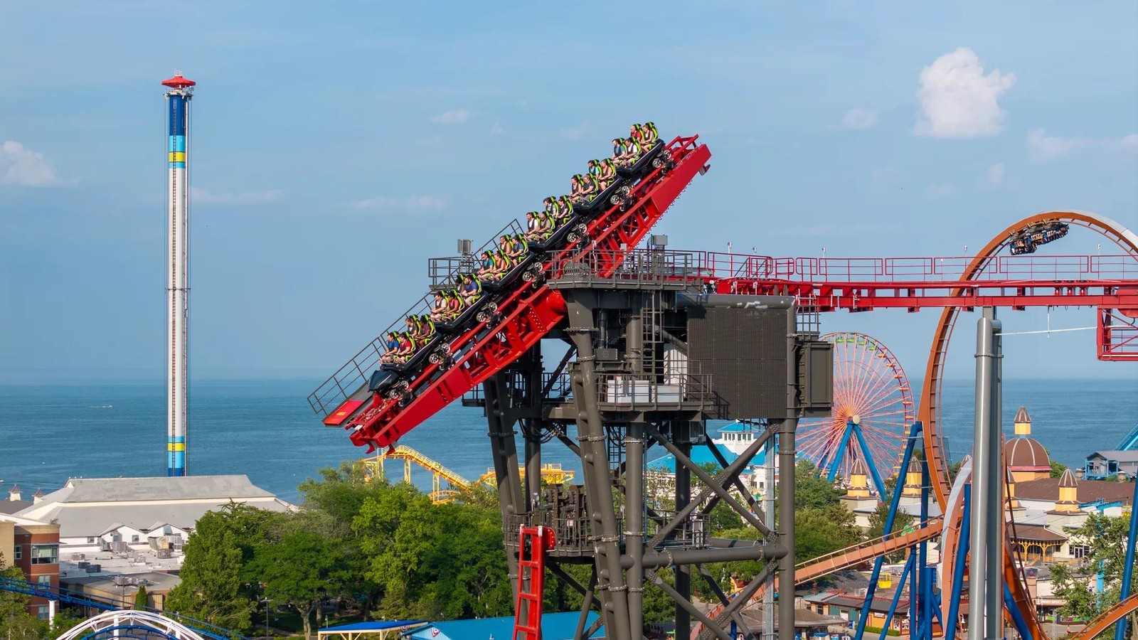 Official daylight Cedar Point parkscape with Sirens Curse, WindSeeker, the Giant Wheel, and Lake Erie