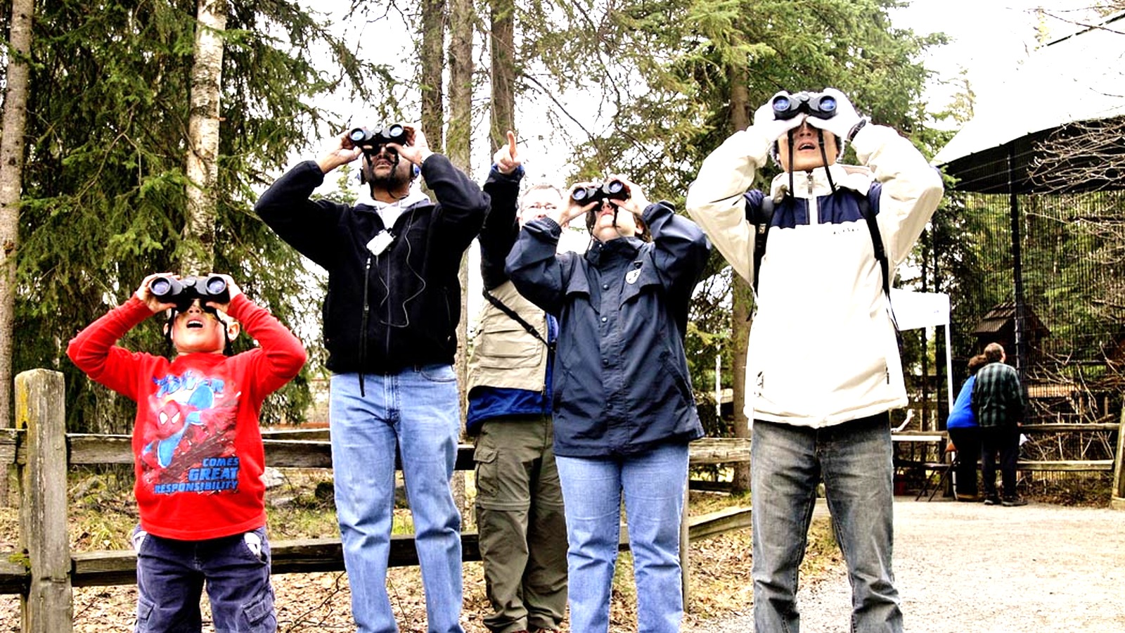 Visitors viewing wildlife at the Alaska Zoo