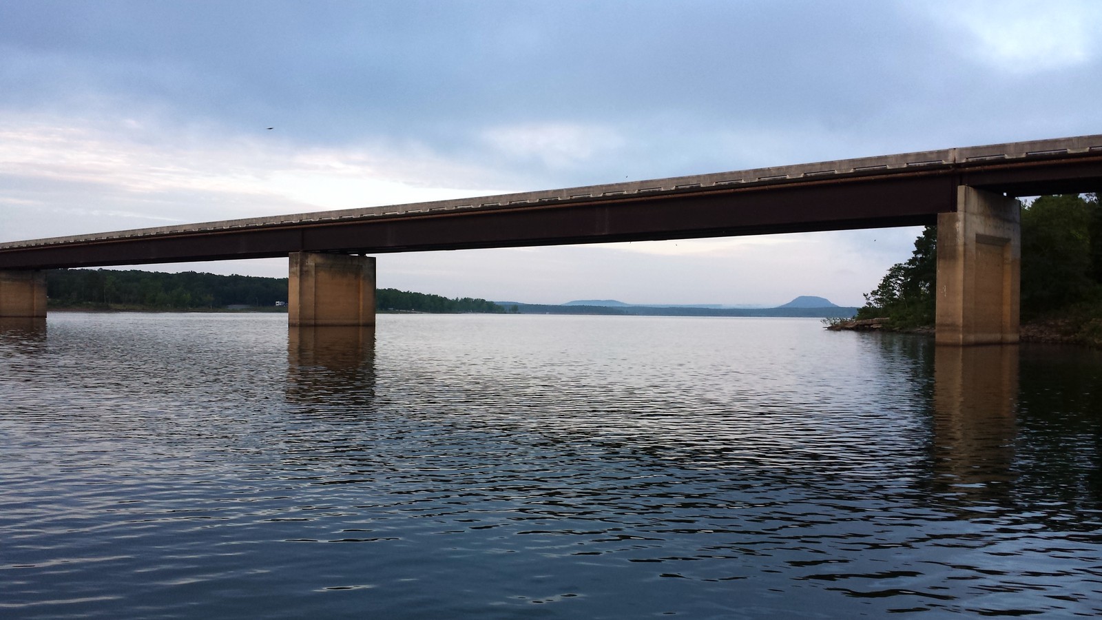 Clear water and wooded shoreline at Greers Ferry Lake