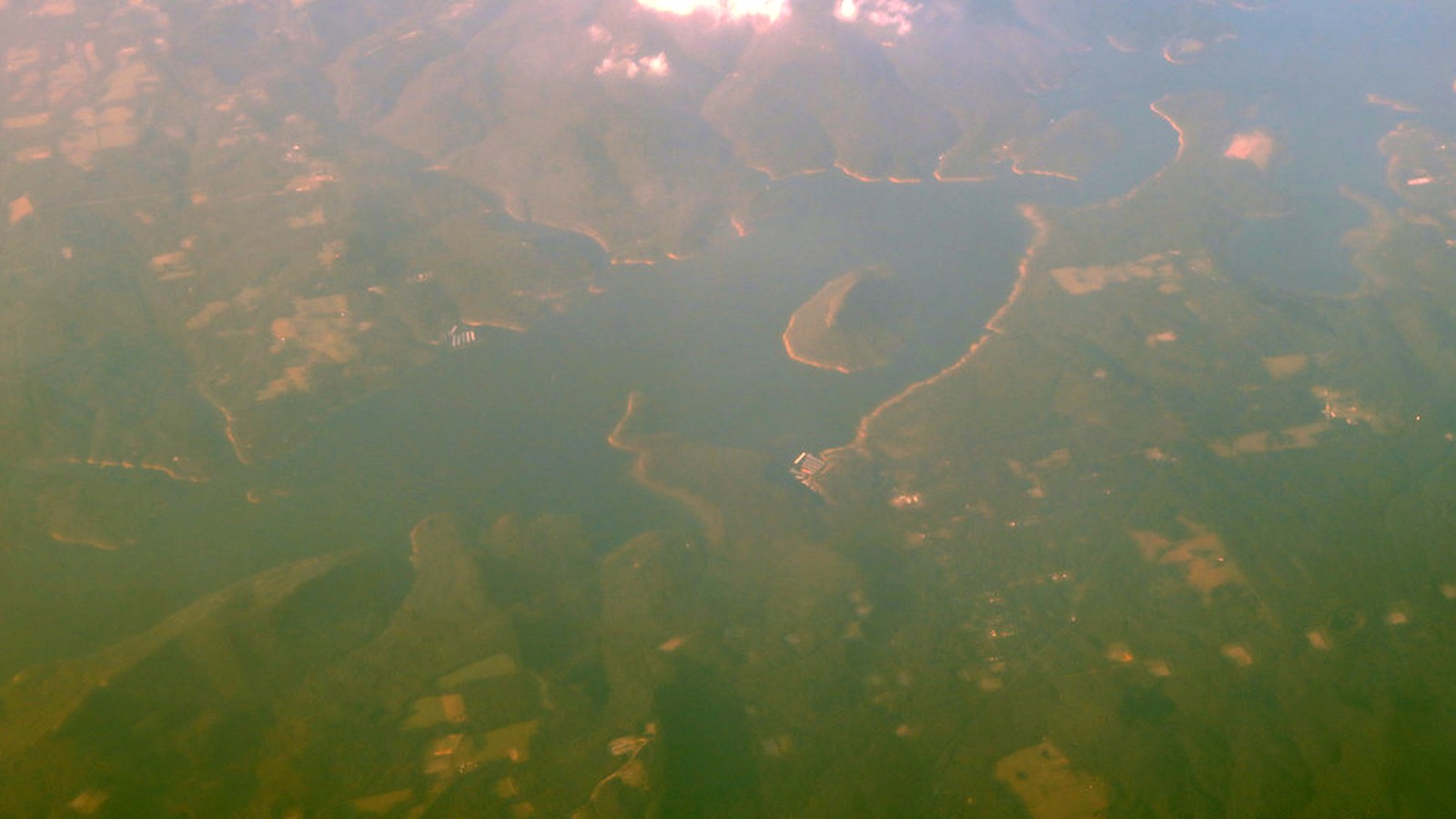 Sugar Loaf Mountain rising from Greers Ferry Lake
