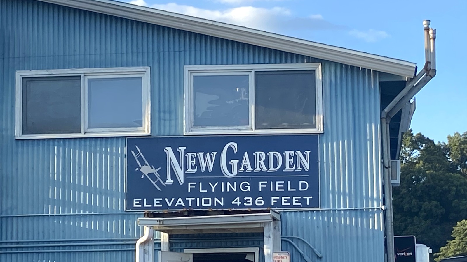 Aircraft and hangars at New Garden Flying Field