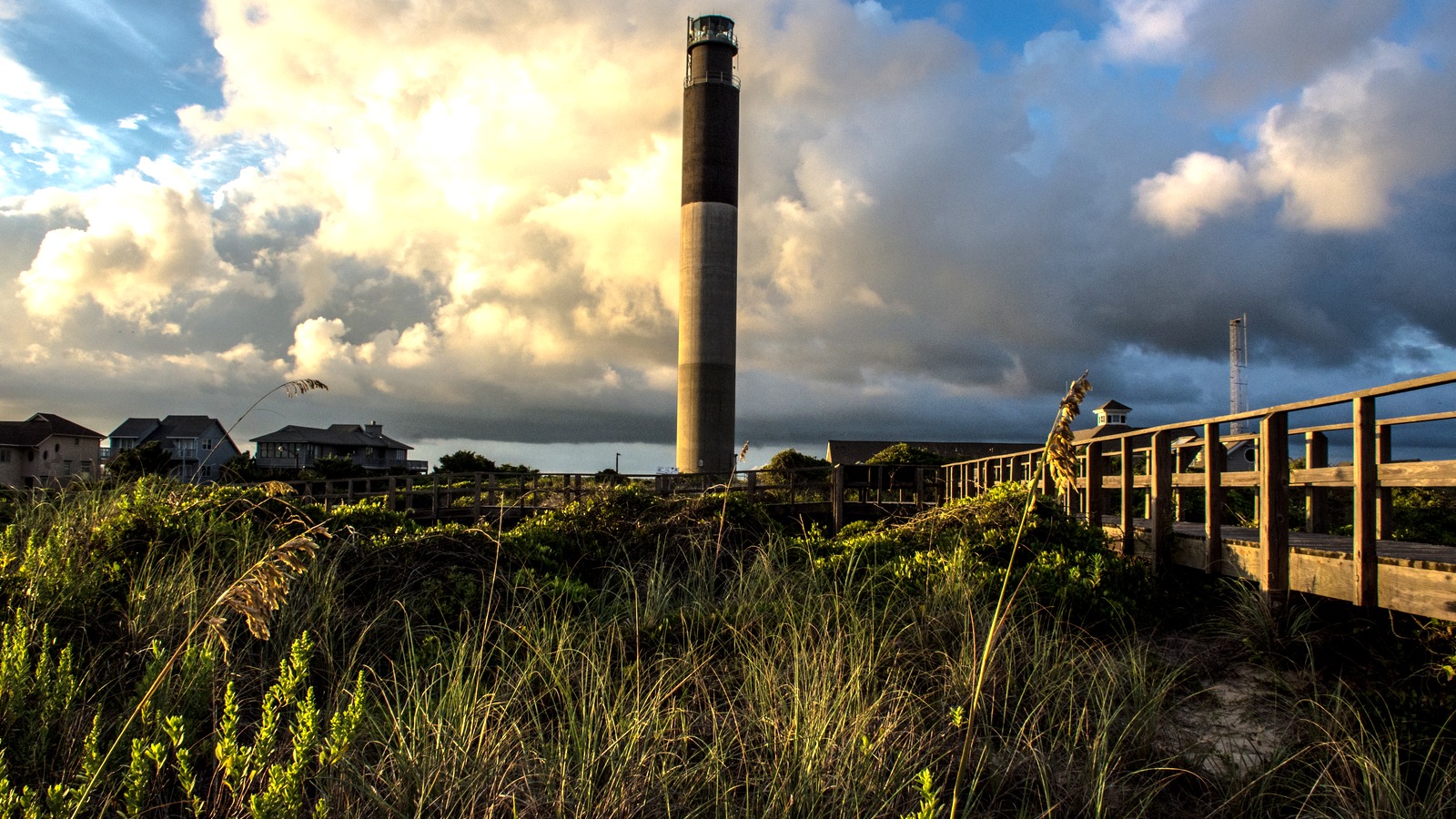 Oak Island Lighthouse above the dunes in Caswell Beach